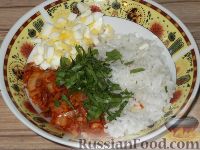Фото приготовления рецепта: Кальмары, фаршированные рисом, луком и яйцом - шаг №9