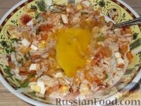 Фото приготовления рецепта: Кальмары, фаршированные рисом, луком и яйцом - шаг №10