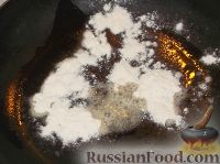 Фото приготовления рецепта: Кальмары, фаршированные рисом, луком и яйцом - шаг №13
