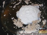 Фото приготовления рецепта: Кальмары, фаршированные рисом, луком и яйцом - шаг №14