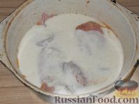 Фото приготовления рецепта: Кальмары, фаршированные рисом, луком и яйцом - шаг №17