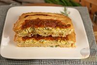 Фото приготовления рецепта: Сырный пирог с зеленью - шаг №11