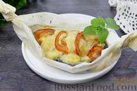 Фото к рецепту: Стейк зубатки с сыром и помидорами, в духовке