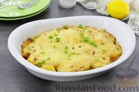 Фото к рецепту: Картофельная запеканка с рыбой и сыром, под соусом бешамель