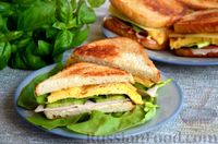 Фото к рецепту: Сэндвичи с омлетом, ветчиной, огурцом и сыром