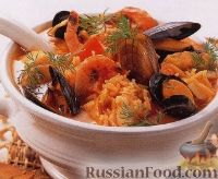 Фото к рецепту: Суп из морепродуктов с рисом