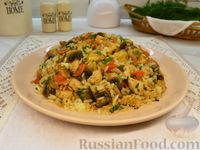 Фото к рецепту: Рис с индейкой, грибами и овощами