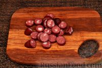 Фото приготовления рецепта: Рагу из говядины с копчёными колбасками, в томатном соусе - шаг №7
