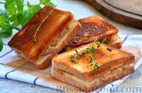 Фото к рецепту: Сэндвичи с тунцом, жареным луком и сыром