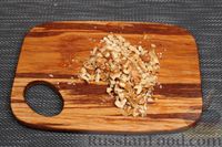 Фото приготовления рецепта: Мягкое яблочное печенье с изюмом и орехами - шаг №9