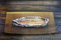 Фото приготовления рецепта: Рыба в сливках, запечённая с помидорами черри (в фольге) - шаг №6