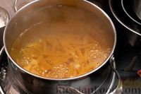 Фото приготовления рецепта: Макароны, запечённые с кабачками, ветчиной и сыром - шаг №2