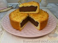 Фото к рецепту: Тёртый пирог с цедрой апельсина и шоколадным заварным кремом