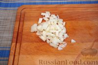 Фото приготовления рецепта: Квашеная капуста, тушенная с курицей и рисом - шаг №3