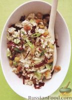 Фото к рецепту: Рисовый салат с изюмом и красным цикорием