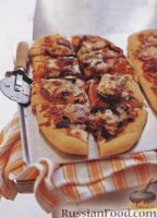 Фото к рецепту: Пицца с салями и оливками