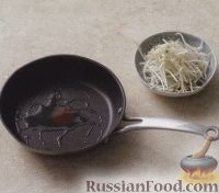 Фото приготовления рецепта: Хек в томатном соусе с солёными огурцами - шаг №12