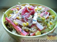 Фото к рецепту: Салат из капусты с крабовыми палочками