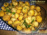 Фото к рецепту: Картофель, запеченный с чесноком в сухарях