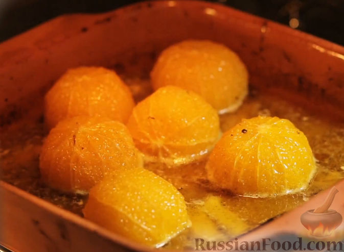 Печеные апельсины. Печеный апельсин. Фаршированные апельсины в духовке. Апельсины запеченные в духовке. Апельсины запеченные в духовке горячий десерт.