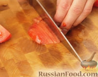 Фото приготовления рецепта: Рыбный рулет, запечённый с морковью, яйцом, сыром и маслинами (в фольге) - шаг №17