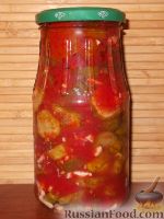 Фото к рецепту: Огурцы в томатной заливке