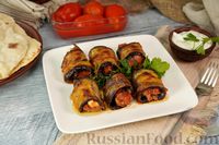 Фото к рецепту: Мелидзанес пильоритикес (рулетики из баклажанов с мясным фаршем)