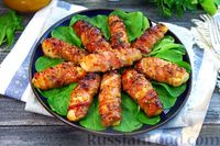 Фото к рецепту: Рулетики из куриного филе в беконе
