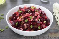 Фото к рецепту: Свекольный салат с фасолью, яблоком и огурцами