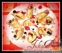 Фото к рецепту: Сладкие роллы с ягодами