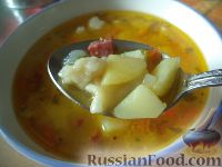 Фото к рецепту: Суп с галушками и копченой колбасой