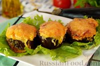 Фото к рецепту: Баклажаны, фаршированные помидорами, яйцами и брынзой