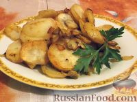 Фото приготовления рецепта: Жареный картофель с грибами - шаг №11
