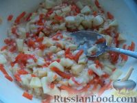 Фото приготовления рецепта: Запеканка из моркови, яблок и риса - шаг №7