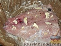 Фото приготовления рецепта: Толстолобик, запеченный по-домашнему - шаг №4