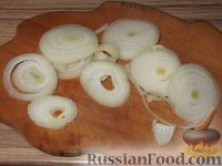 Фото приготовления рецепта: Толстолобик, запеченный по-домашнему - шаг №5