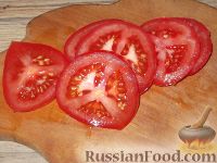 Фото приготовления рецепта: Толстолобик, запеченный по-домашнему - шаг №6