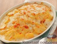 Фото к рецепту: Картофель, запеченный в молочном соусе