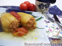 Фото к рецепту: Перец, фаршированный мясом и рисом