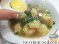 Фото приготовления рецепта: Суп с пельменями (на бульоне) - шаг №6
