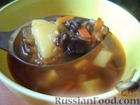 Фото к рецепту: Суп из чечевицы с сушеными грибами