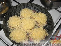 Фото приготовления рецепта: Свиные отбивные, запеченные под ананасами и сыром - шаг №5