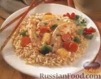 Фото к рецепту: Рис с куриным филе, запеченный в духовке
