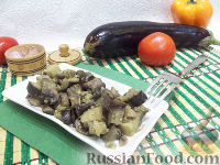 Фото к рецепту: Острый салат из баклажанов и шампиньонов