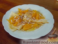 Фото к рецепту: Блины с апельсиновым соусом
