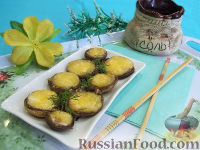 Фото к рецепту: Шампиньоны, фаршированные орехами и сыром