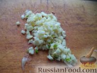 Фото приготовления рецепта: Кролик, тушенный с овощами, в сметане - шаг №7