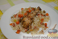 Фото к рецепту: Запеченные куриные ножки с рисом и овощами