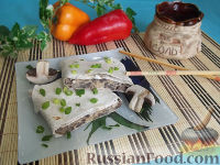 Фото к рецепту: Рулет из лаваша с грибами и сыром