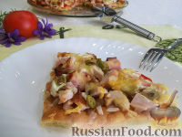 Фото приготовления рецепта: Пицца по-домашнему, с ветчиной, помидорами, оливками - шаг №20